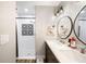 Modern bathroom with updated fixtures and double vanity at 1413 Sandalwood Dr, Plant City, FL 33563