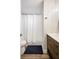Modern bathroom featuring a tub/shower combo and stylish cabinetry at 1413 Sandalwood Dr, Plant City, FL 33563