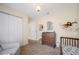 Charming Bedroom with a crib and ample closet space at 1413 Sandalwood Dr, Plant City, FL 33563