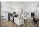 Modern kitchen features white shaker cabinets, granite countertops, and stainless steel appliances at 1413 Sandalwood Dr, Plant City, FL 33563