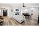 Spacious living area featuring a modern fireplace and light wood flooring at 1413 Sandalwood Dr, Plant City, FL 33563