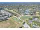 Aerial view of community landscape, including homes and golf course at 3507 Autumn Glen Dr, Valrico, FL 33596