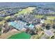 Aerial view of community amenities including tennis courts, pool, and clubhouse at 3507 Autumn Glen Dr, Valrico, FL 33596
