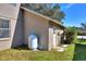 Small storage shed in the backyard with a propane tank at 3507 Autumn Glen Dr, Valrico, FL 33596