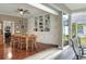 Bright dining room features built-in cabinetry and access to a screened patio at 3507 Autumn Glen Dr, Valrico, FL 33596