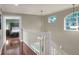 Hallway leading to a bedroom with hardwood floors at 3507 Autumn Glen Dr, Valrico, FL 33596