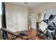 Home gym with elliptical and weight bench at 3507 Autumn Glen Dr, Valrico, FL 33596