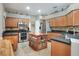 Modern kitchen with stainless steel appliances and granite countertops at 3507 Autumn Glen Dr, Valrico, FL 33596