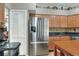 Stainless steel appliances and granite countertops in this kitchen at 3507 Autumn Glen Dr, Valrico, FL 33596