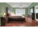 Spacious main bedroom with large bed and dresser at 3507 Autumn Glen Dr, Valrico, FL 33596