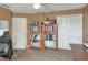 Home office with built-in shelving and large closet at 3507 Autumn Glen Dr, Valrico, FL 33596