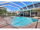 Spacious screened pool and spa with surrounding patio at 3507 Autumn Glen Dr, Valrico, FL 33596