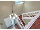 View of the staircase with chandelier and hardwood floors at 3507 Autumn Glen Dr, Valrico, FL 33596