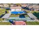 Community pool, shuffleboard courts, and clubhouse at 4531 Blossom Blvd # 4531, Zephyrhills, FL 33542