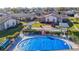 Community overview featuring pool, shuffleboard, and homes at 4531 Blossom Blvd # 4531, Zephyrhills, FL 33542