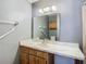 Bathroom with vanity, mirror, and shower at 4531 Blossom Blvd # 4531, Zephyrhills, FL 33542