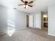Bedroom with ceiling fan and ample closet space at 4531 Blossom Blvd # 4531, Zephyrhills, FL 33542
