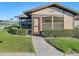 Inviting exterior with a well-maintained lawn and walkway at 4531 Blossom Blvd # 4531, Zephyrhills, FL 33542
