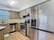 Kitchen featuring stainless steel appliances and wood cabinets at 4531 Blossom Blvd # 4531, Zephyrhills, FL 33542