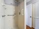 Shower stall with grab bars, tiled walls at 4531 Blossom Blvd # 4531, Zephyrhills, FL 33542