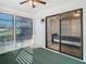 Sunroom with access to a bedroom and window coverings at 4531 Blossom Blvd # 4531, Zephyrhills, FL 33542