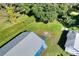 Aerial view of a blue house and surrounding yard at 1106 Powell St, Plant City, FL 33563