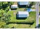 Aerial view showing home, yard, and detached structure at 1106 Powell St, Plant City, FL 33563