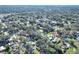 Aerial view showing home's location in a residential neighborhood at 1106 Powell St, Plant City, FL 33563