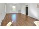 Bright bedroom with hardwood floors and large window at 1106 Powell St, Plant City, FL 33563