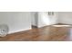 Hardwood floors and large windows in this living room at 1106 Powell St, Plant City, FL 33563