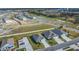 Aerial view of houses in a residential neighborhood by a lake at 3510 N Maryland Ave, Plant City, FL 33565