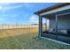 House with screened porch and grassy backyard at 3510 N Maryland Ave, Plant City, FL 33565