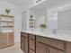 Elegant bathroom with double vanity and large mirror at 3510 N Maryland Ave, Plant City, FL 33565