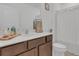 Clean bathroom with single vanity and shower/tub combo at 3510 N Maryland Ave, Plant City, FL 33565