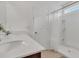 Bathroom with double vanity, shower, and white decor at 3510 N Maryland Ave, Plant City, FL 33565