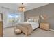 Cozy bedroom with light wood platform bed and neutral decor at 3510 N Maryland Ave, Plant City, FL 33565