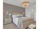 Cozy bedroom with light wood platform bed and neutral decor at 3510 N Maryland Ave, Plant City, FL 33565