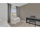Relaxing bedroom with comfy chair and piano at 3510 N Maryland Ave, Plant City, FL 33565