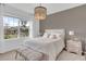 Spacious bedroom with large window and neutral decor at 3510 N Maryland Ave, Plant City, FL 33565