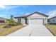 Single-story home with attached garage and landscaping at 3510 N Maryland Ave, Plant City, FL 33565
