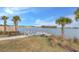 Peaceful lakefront community with a dock and bench for relaxing at 3510 N Maryland Ave, Plant City, FL 33565