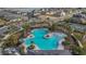 Community pool with surrounding lounge chairs at 3510 N Maryland Ave, Plant City, FL 33565