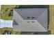 Top-down view of a house roof with solar vents and gray shingles at 3510 N Maryland Ave, Plant City, FL 33565