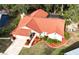 House with a pool and a large backyard, seen from an aerial perspective at 3633 Nettle Creek Ct, Holiday, FL 34691