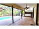 Relaxing pool area with covered patio and outdoor kitchen at 3633 Nettle Creek Ct, Holiday, FL 34691