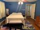 Bright bedroom with a queen-size bed and light-colored bedding at 750 Charlie Taylor Rd, Plant City, FL 33566