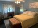 Bright bedroom with a king-size bed and large windows at 750 Charlie Taylor Rd, Plant City, FL 33566