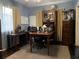 Home office features a large desk and ample storage at 750 Charlie Taylor Rd, Plant City, FL 33566