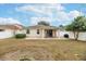 Large backyard with patio, grill, and shed at 269 Fairmont Dr, Spring Hill, FL 34609