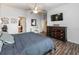 Spacious bedroom with large bed, dresser, and plenty of natural light at 269 Fairmont Dr, Spring Hill, FL 34609